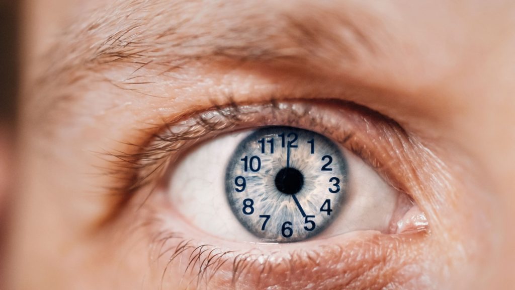clock in someone's eye