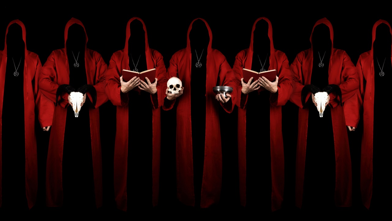 Members of cult in red robes