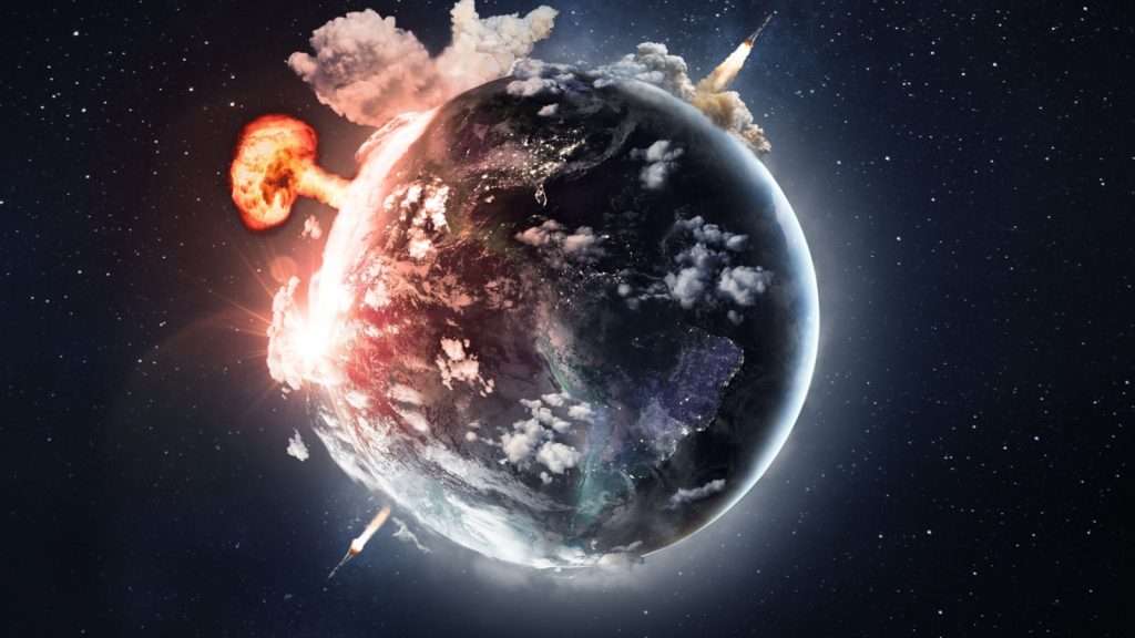 Atomic explosion on planet earth, view from space. Air strike missiles. Bomb blast. Hydrogen bomb. Nuclear mushroom. Elements of this image are furnished by NASA
