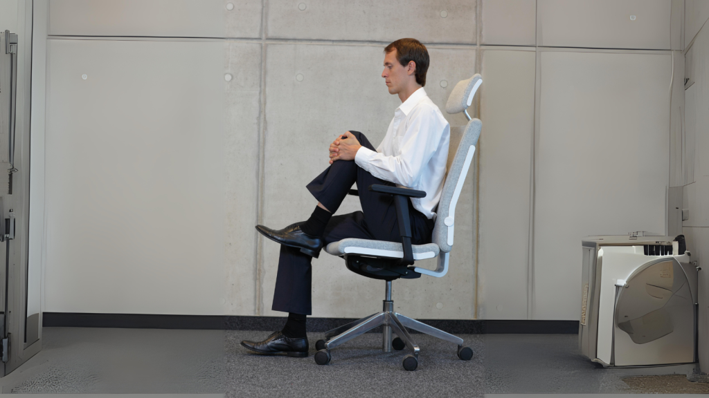 Man doing seated march in his office chair