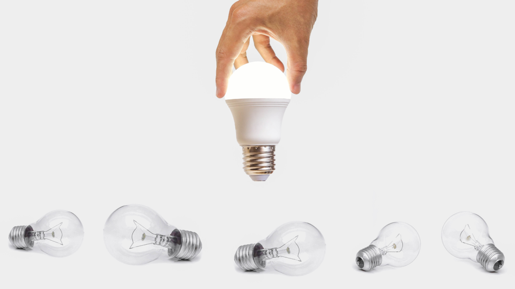 Hand holding a LED light bulb