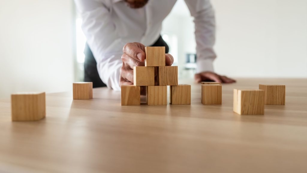 Businessman leaning carefully