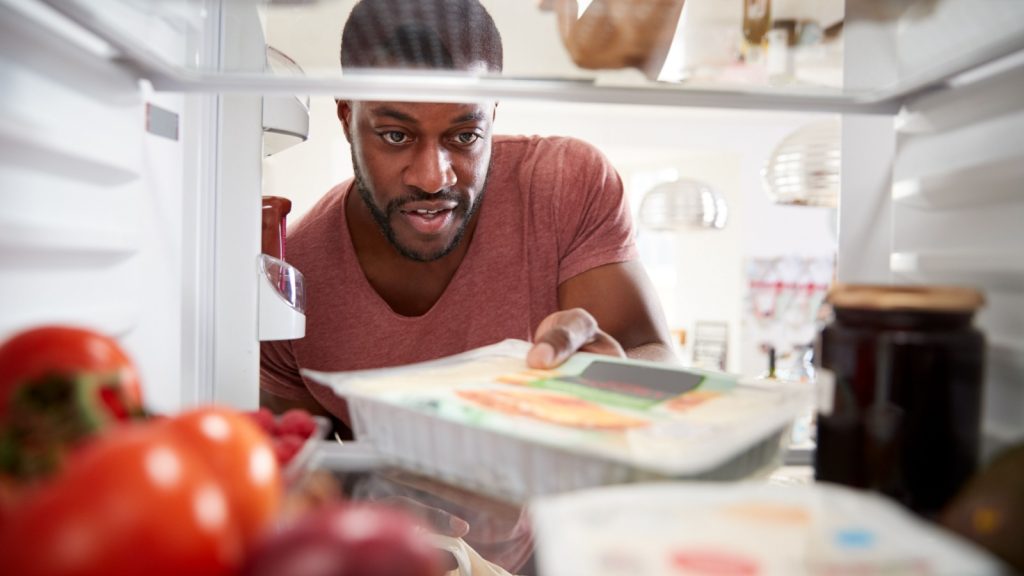 man getting out ready to eat meals