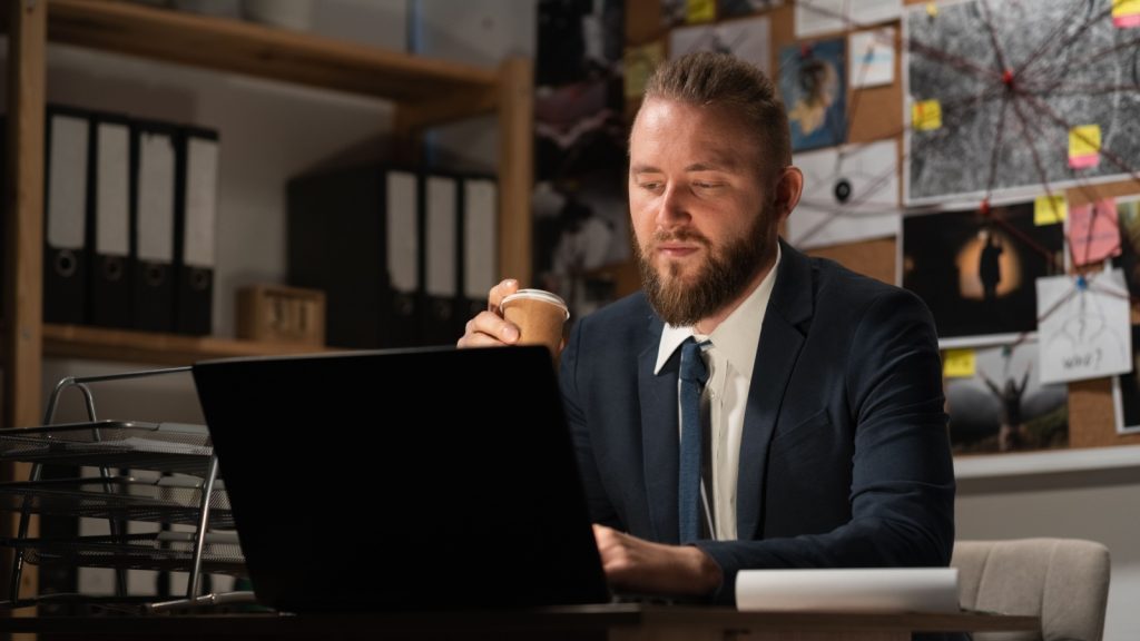 a man working on his laptop
