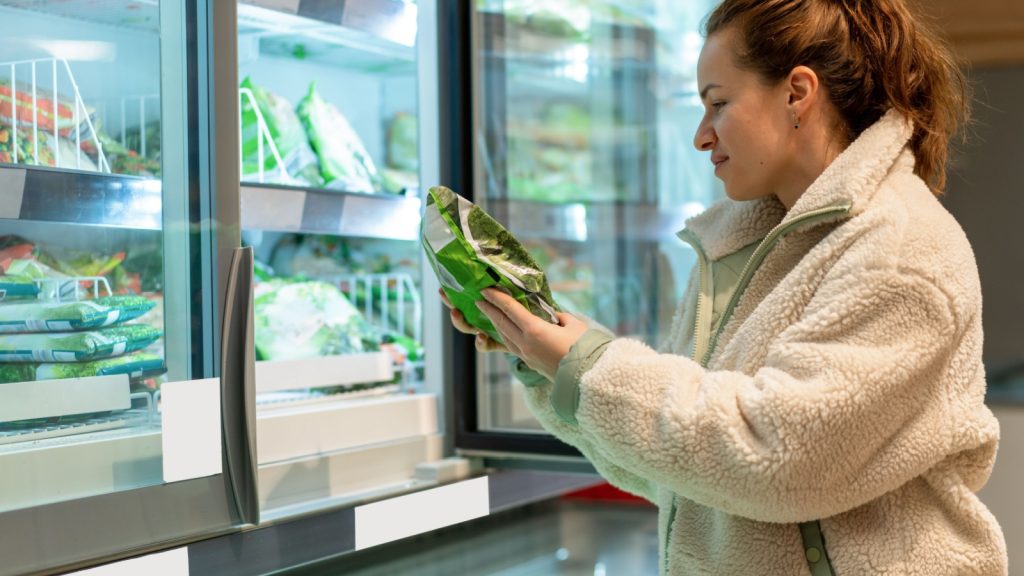 women looking for frozen veggies