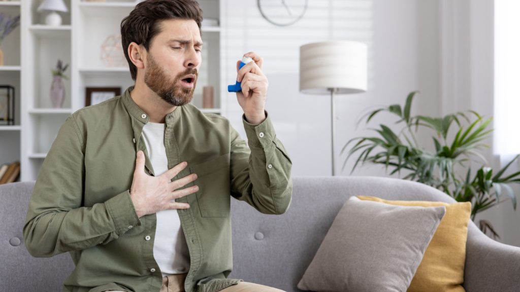 man using inhaler