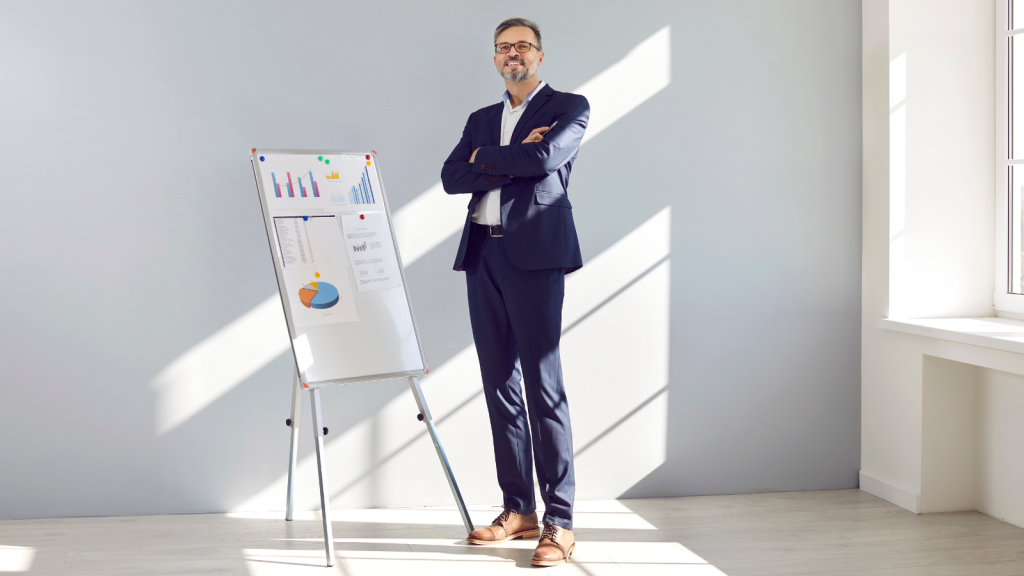 happy confident mature business man in a suit