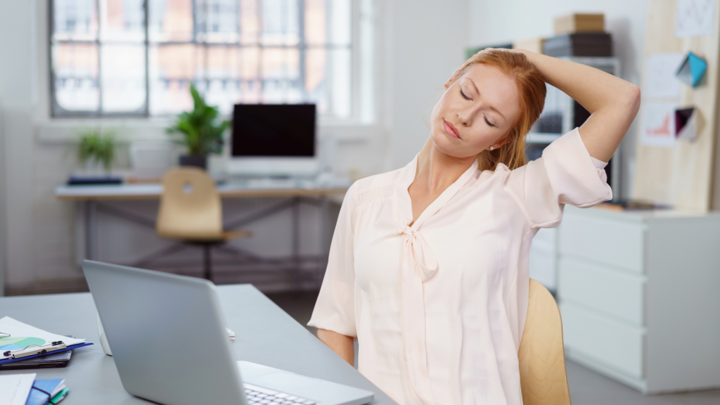 Woman doing neck stretching exercise