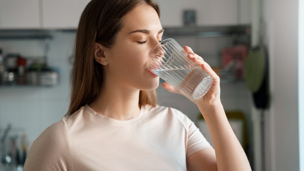 Woman drinking a glass of water