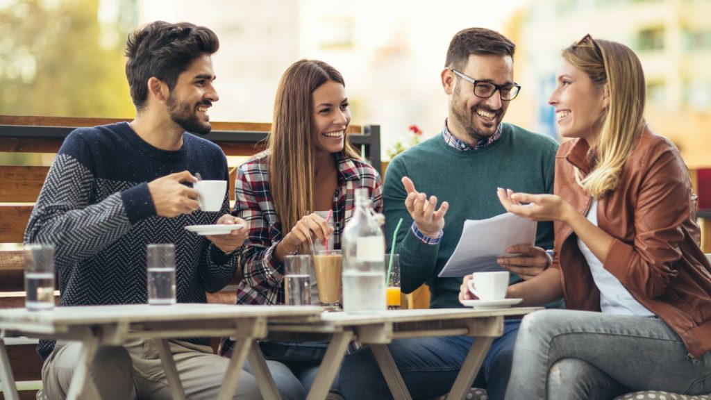 A group of friends having fun a coffee together