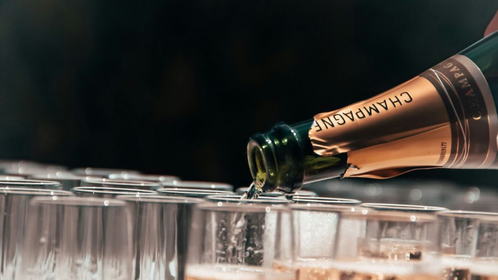 Champagne pouring on glass