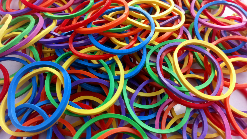 Closeup colorful rubber band on white background