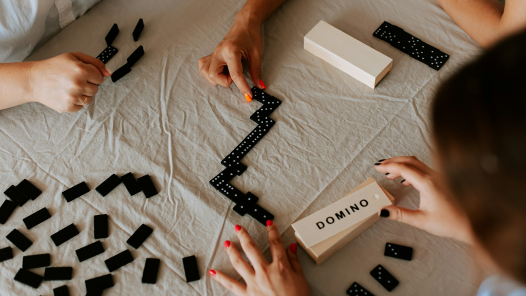 Couple of people playing domino