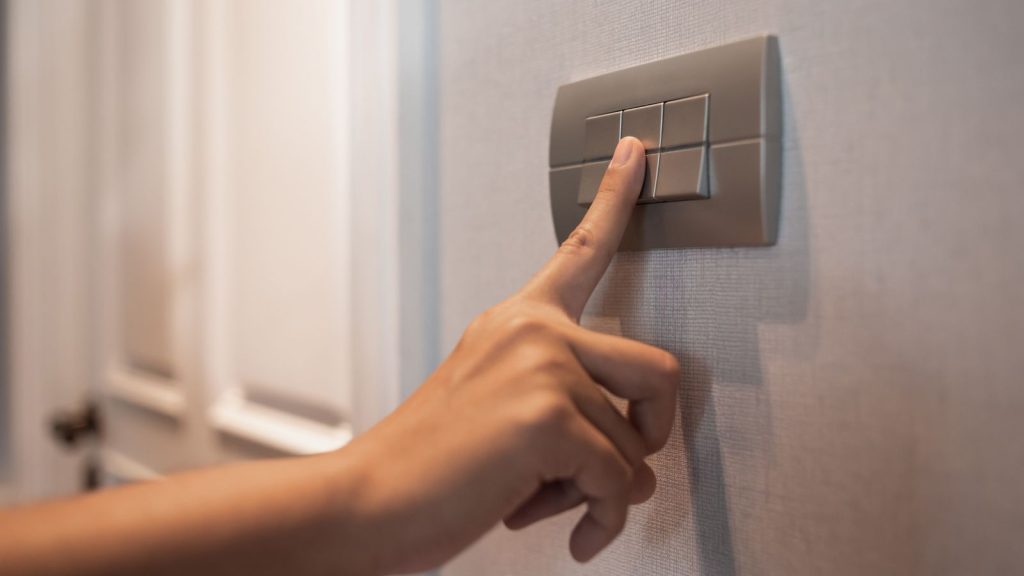 Finger pressing light switch with metal cover