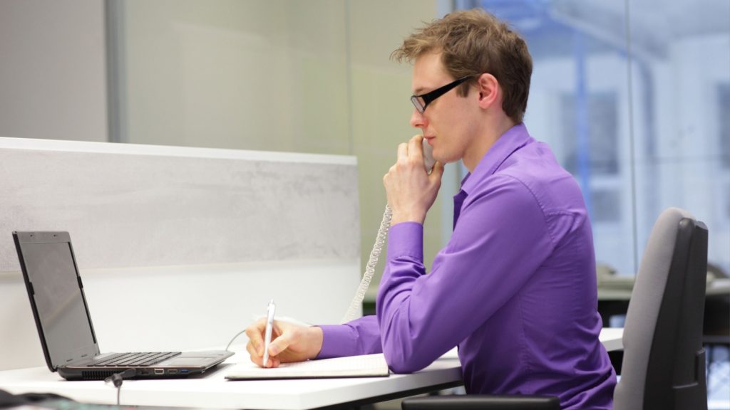 Man working in front of laptop