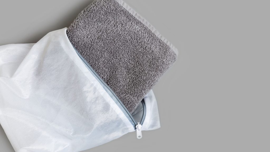 gray microfibre cloth folded in a zipper bag