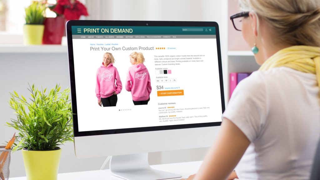 Woman creating her own products by using print on demand service online