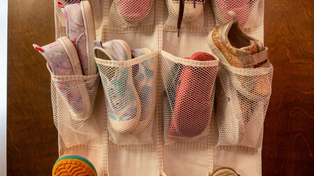 children's shoes in a hanging organizer