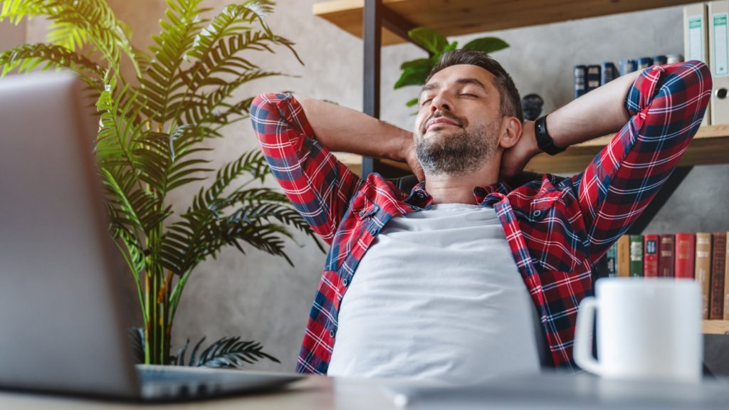 a man relaxing at work
