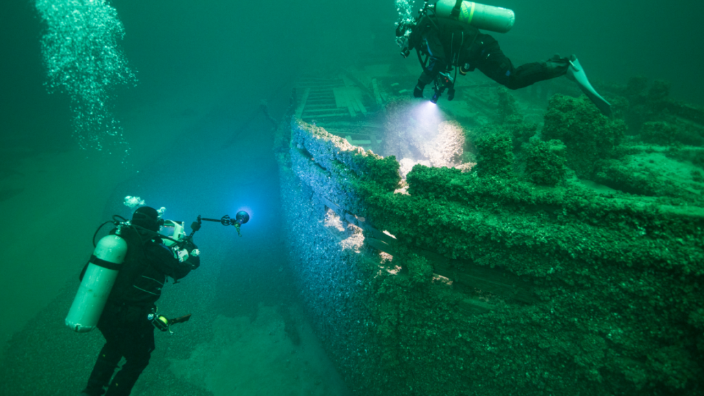 shipwreck with two divers
