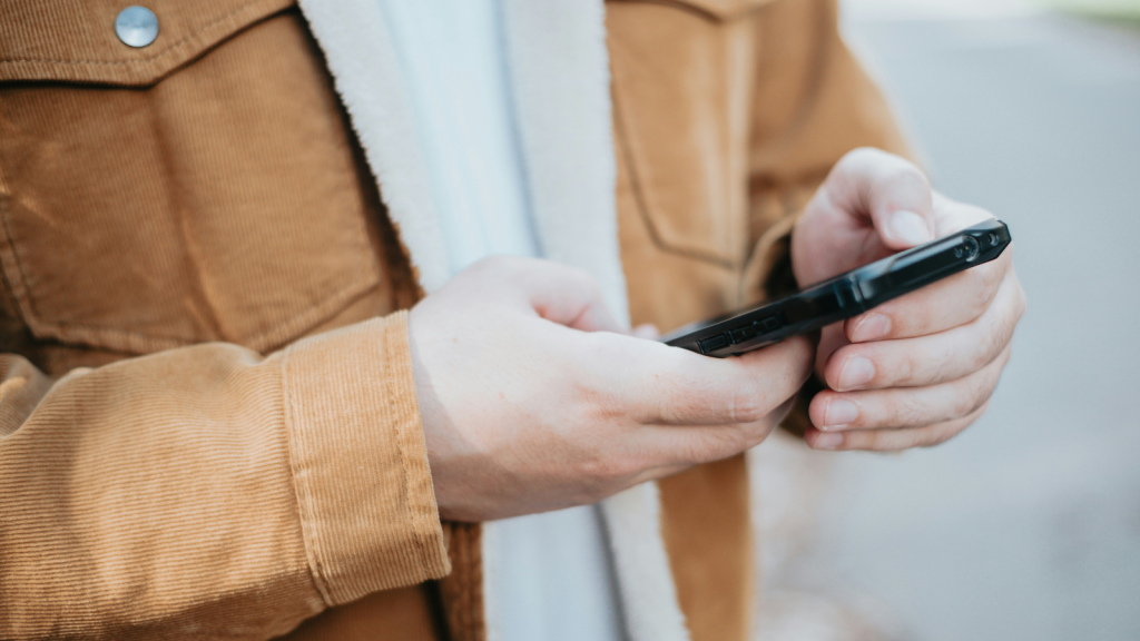 using smartphone in public
