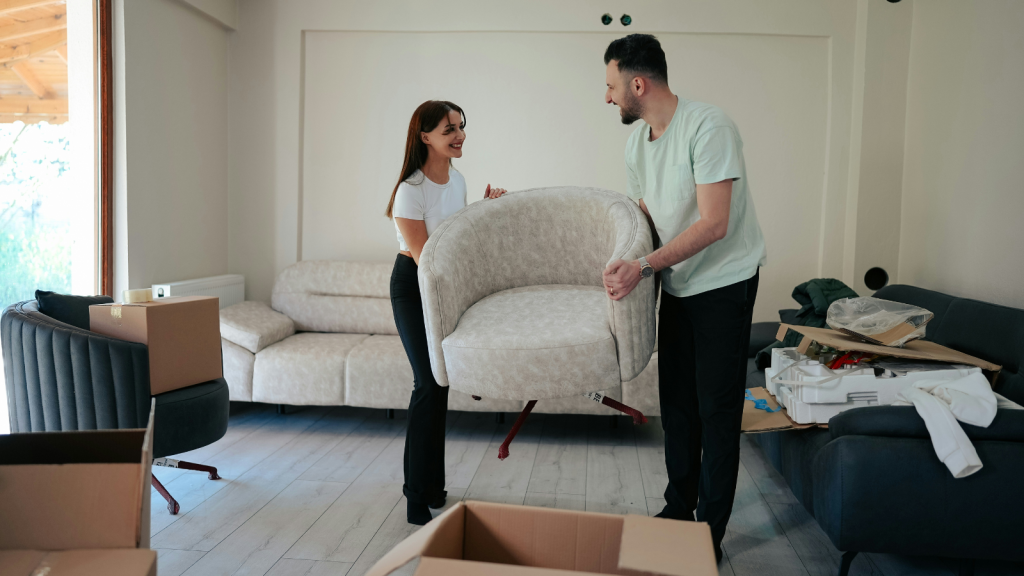 Man and woman moving furniture