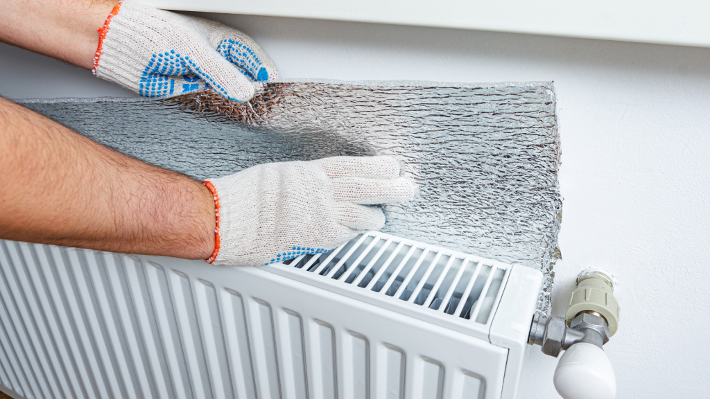 Foil behind radiator