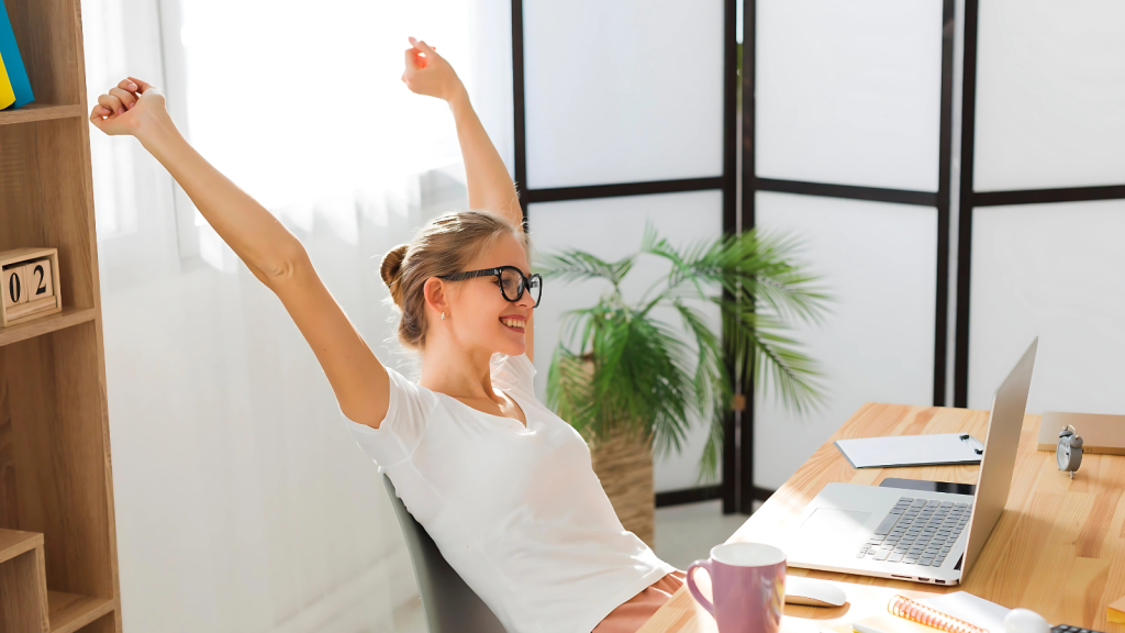 Happy woman working in office