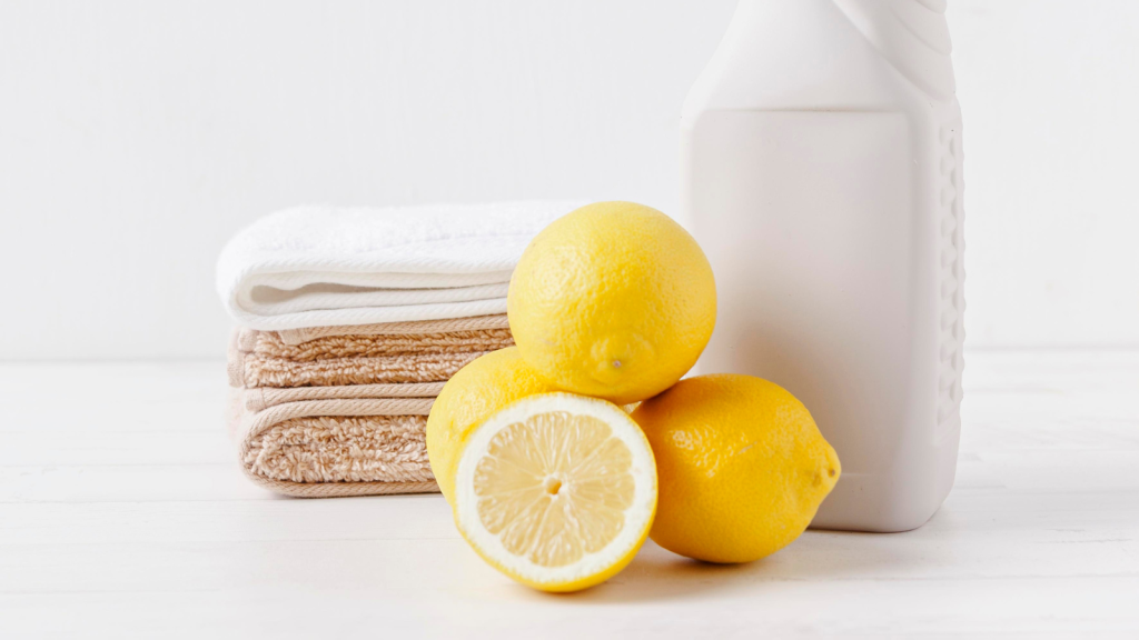 Lemons with cleaning products