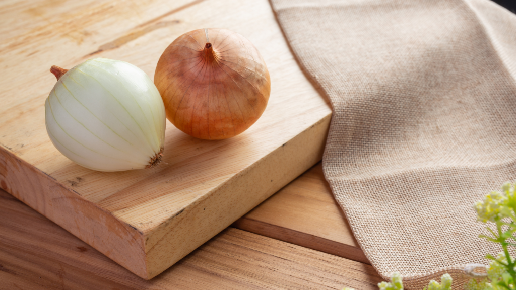 Onions on chopping board