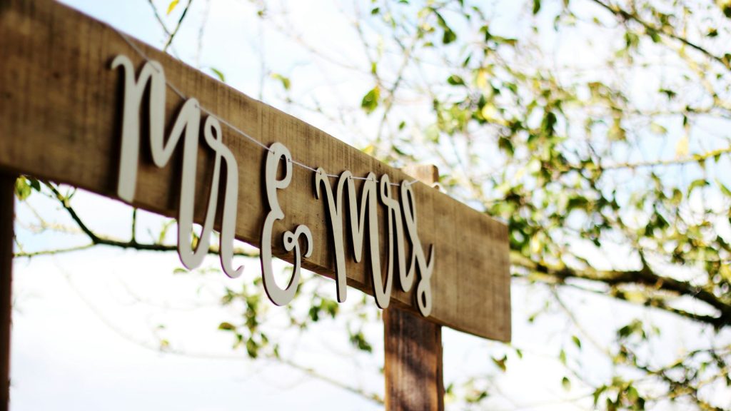 Wedding venue archway with Mr. and Mrs. signage