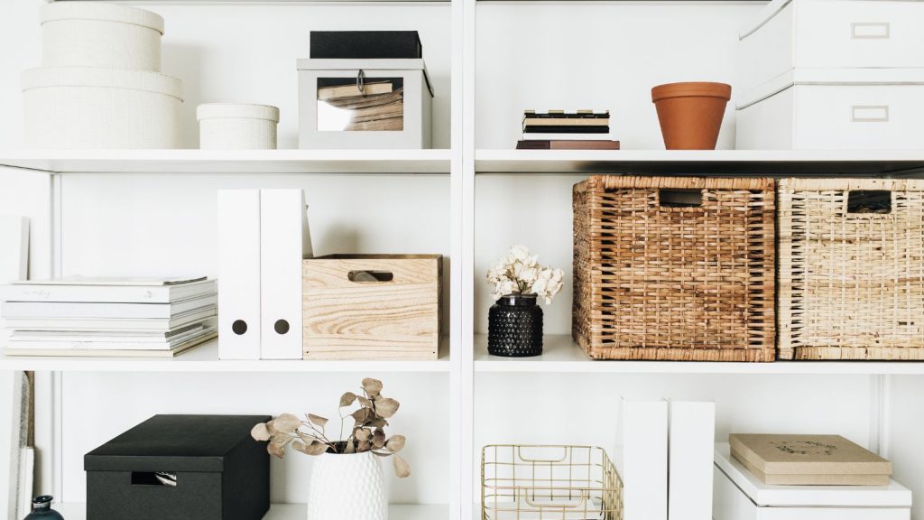 White storage shelves rack with boxes