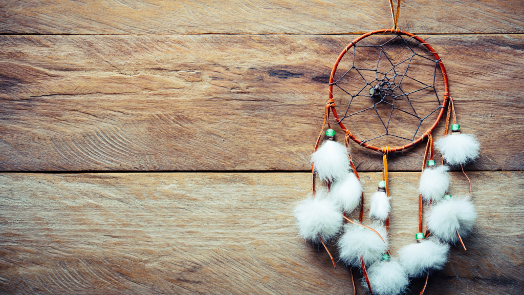 Dream catcher on wooden floor