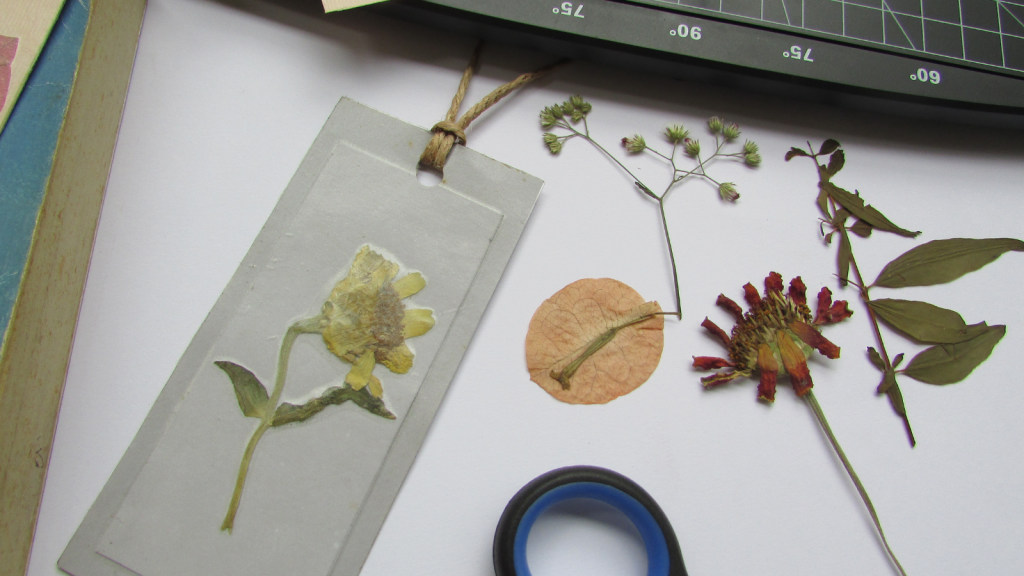 Making pressed plant bookmarks with rope