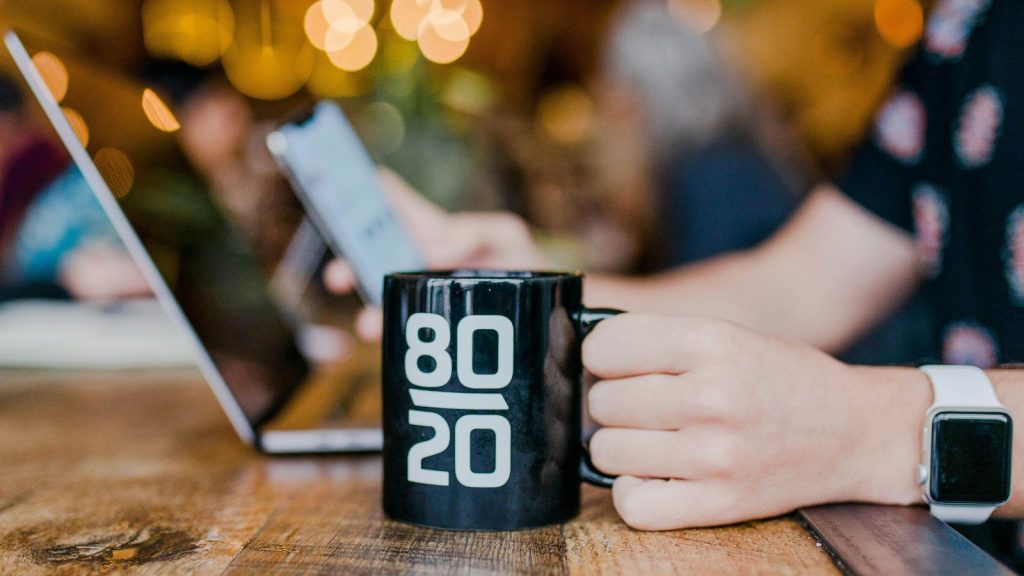 mug with 80/20 written on it