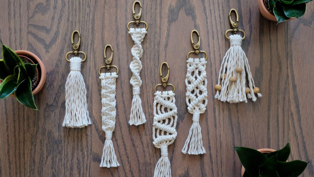 Five hand made cotton macrame key chains of different styles. 