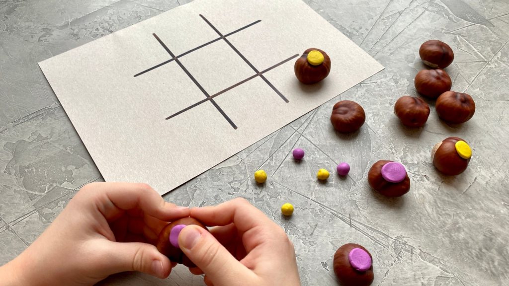 children hands making board game