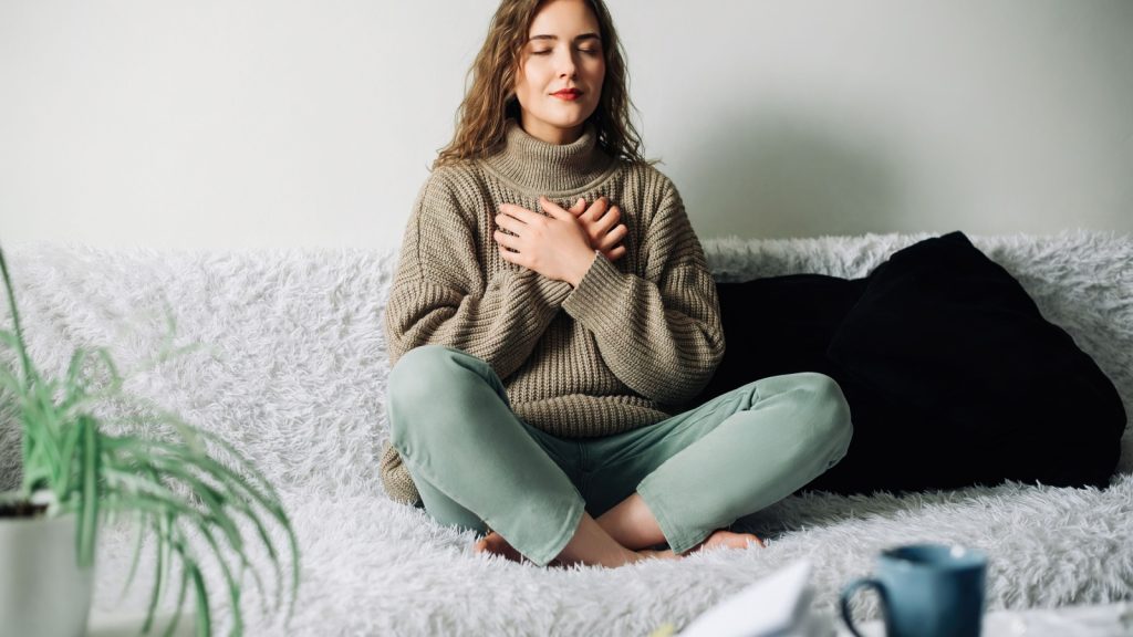 Woman practicing mindful breathing