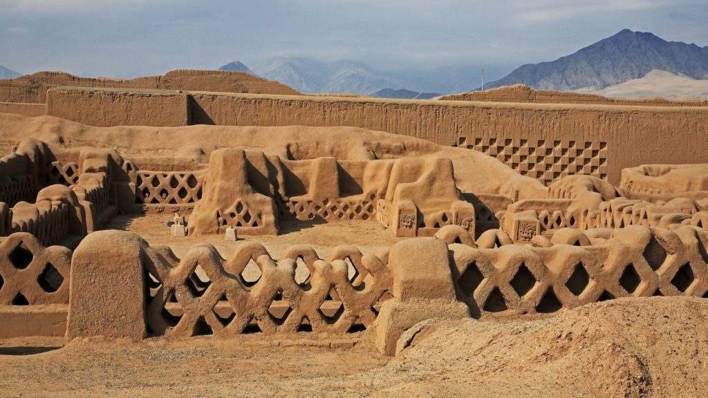 ruins of Chan Chan with fishnet carvings