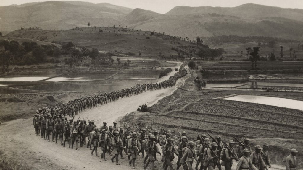 soldiers marching on a line