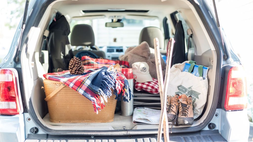 trunk of a car filled with things for summer