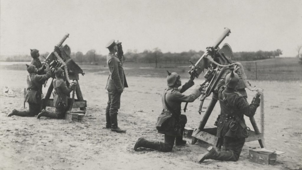 German soldiers aiming anti-aircraft machine guns