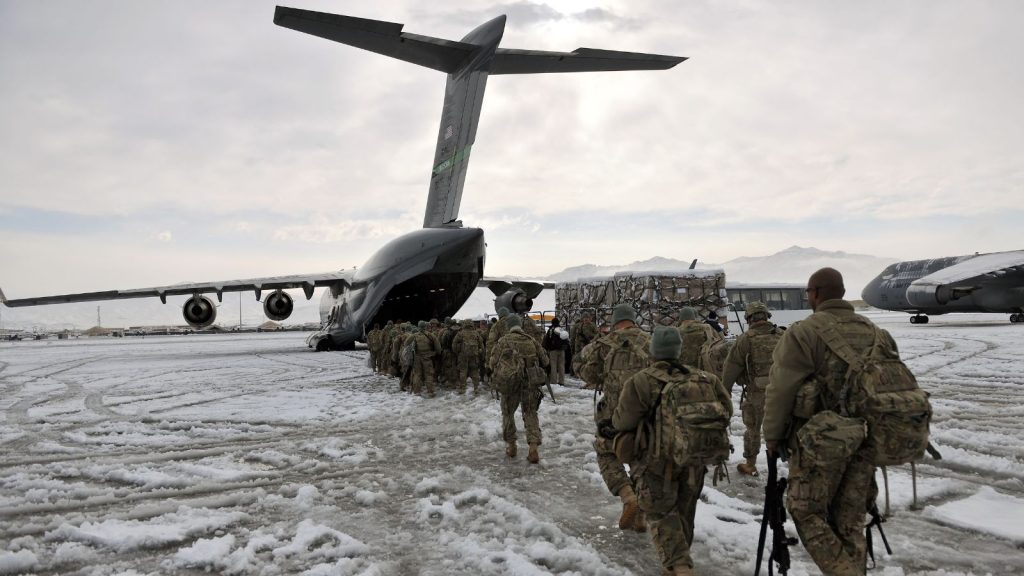 soldiers board a U.S. Air Force aircraft