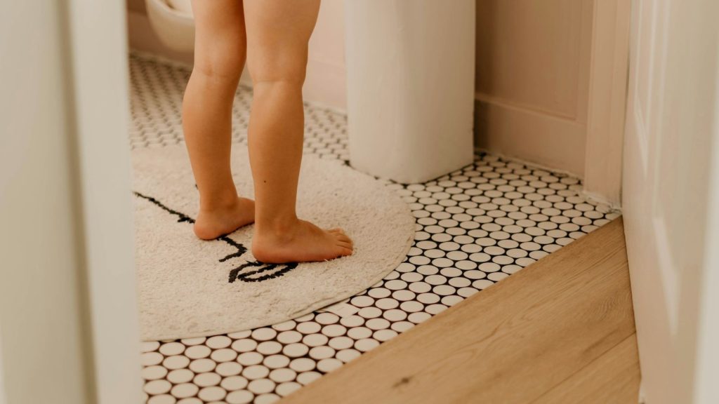 woman's feet on a plush bath mat