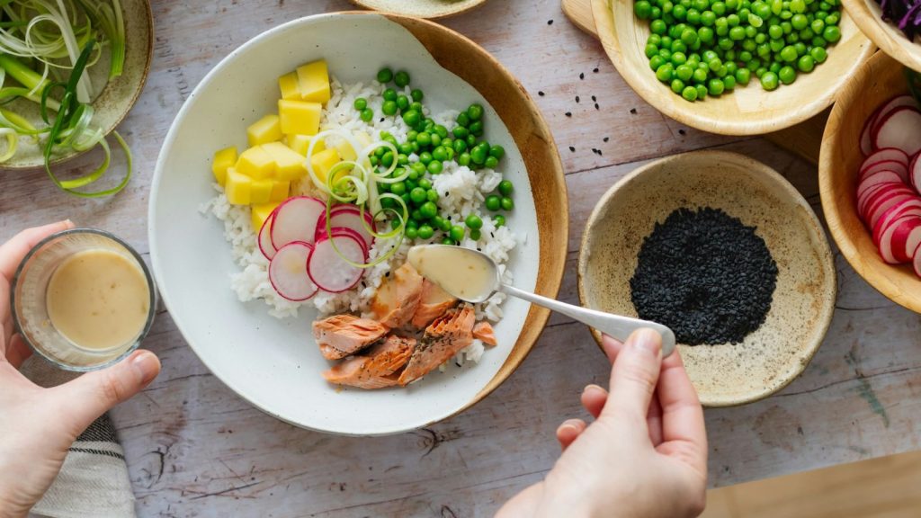 a person preparing a healthy meal