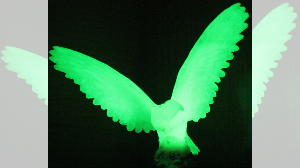 a glow in the dark bird figure