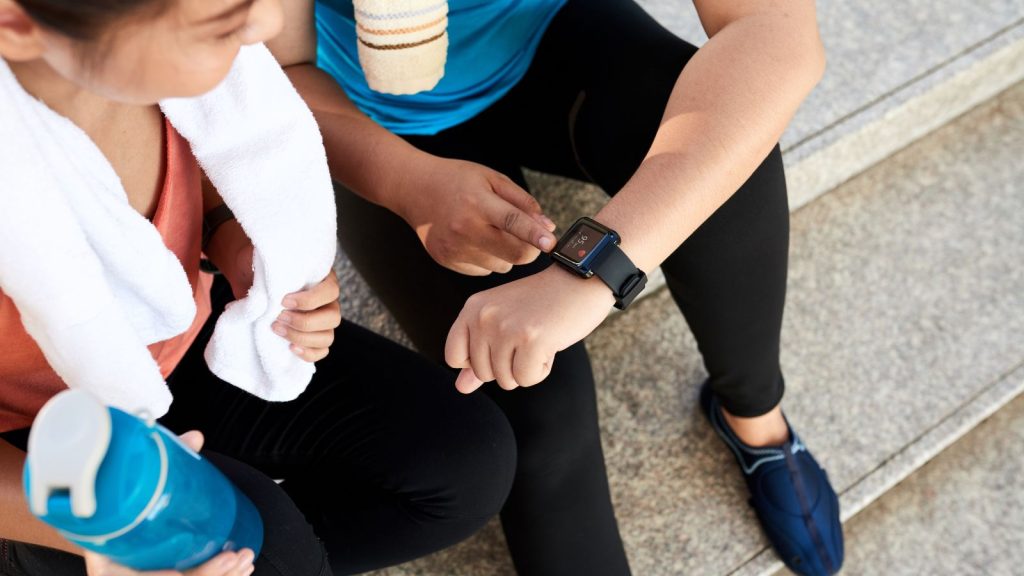 women checking watch