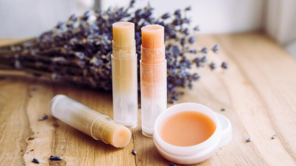 High angle view of homemade lip balms on table
