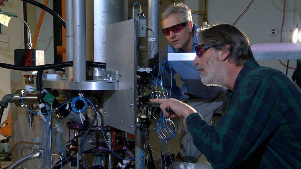 physicists checking the  fountain atomic clock