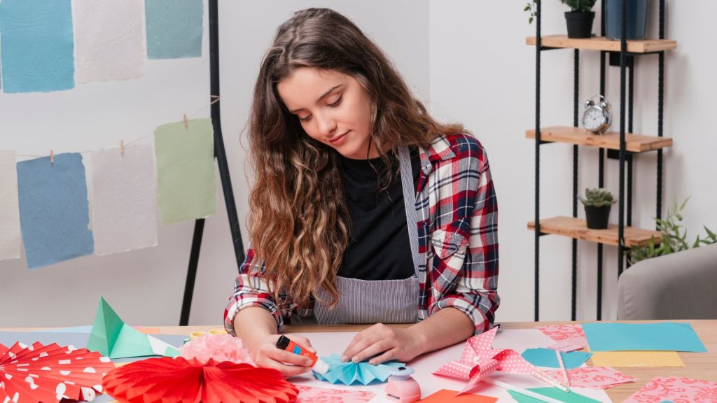 Woman making creative art work.